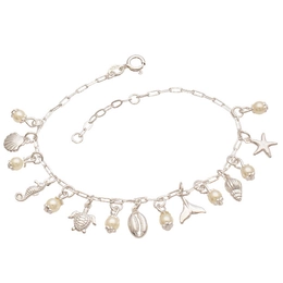 Silver bracelet with 8 4mm pearls and 7 different sea pendants